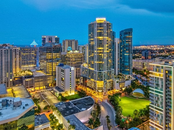 exterior of 100 las olas at night with lights